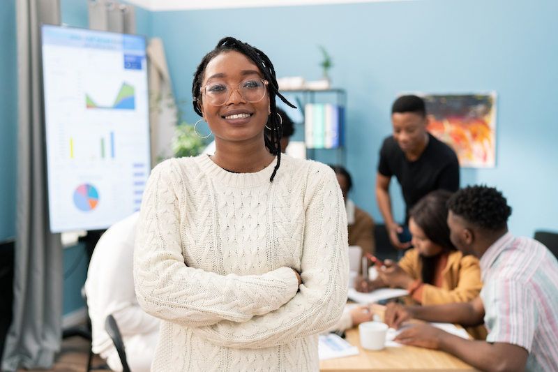 Smiling young woman in a workplace