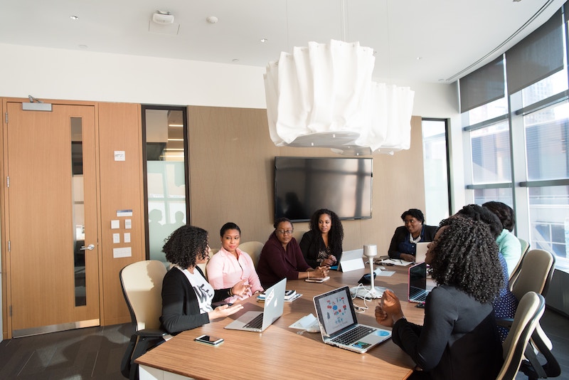 Black women in an a board meeting