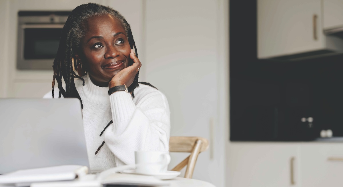 Older black woman thinking about work-life balance